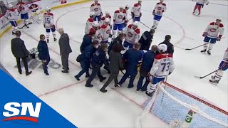 Jake Evans Stretchered Off Ice After Huge Hit From Mark Scheifele Following Empty Net Goal [upl. by Hare22]